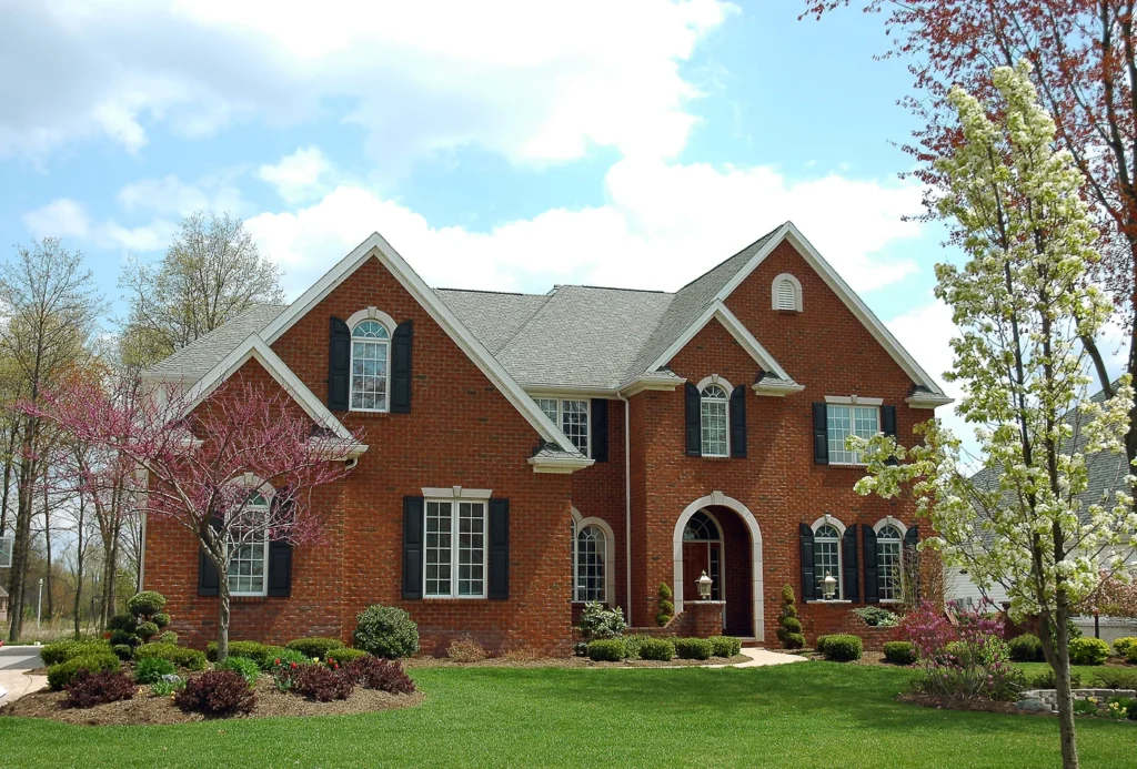 Red brick home with shingle roof replacement in Mt Juliet TN
