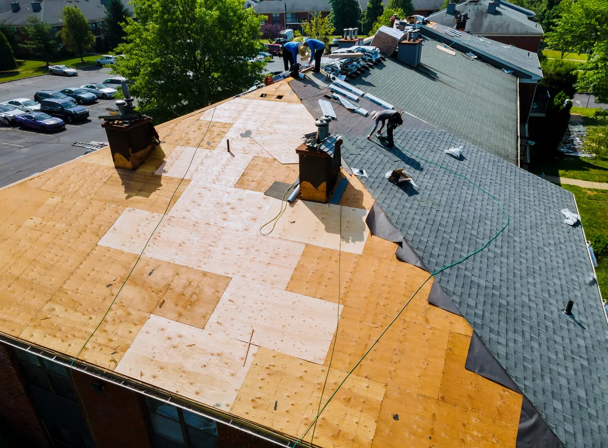 roofers installing a new roof